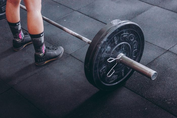 benefits of powerlifting for women as strength