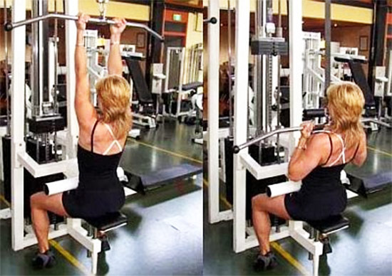 a female performing bicep pulldowns as part of her bicep workout in the gym
