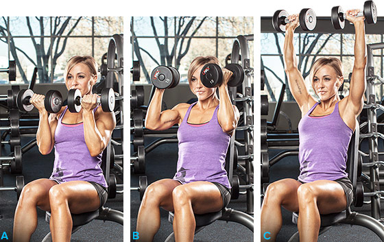a girl performing the arnold press to get rid of her flabby arms 