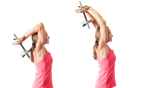 a girl performing tricep extensions to get rid of her flabby arms 