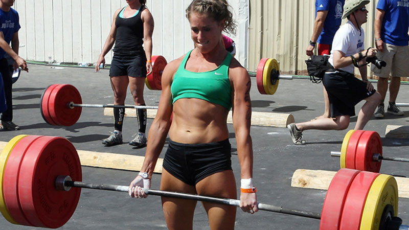 Female athlete deadlifting at a competition